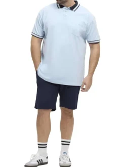 Polo en coton bleu ciel à détails bleus marine uni à coupe droite avec une poche