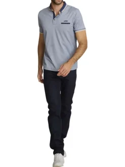 Polo en coton bleu clair avec une coupe droite et une poche passepoilée