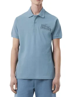 Polo en coton bleu en maille piquée avec une coupe droite et un col à revers
