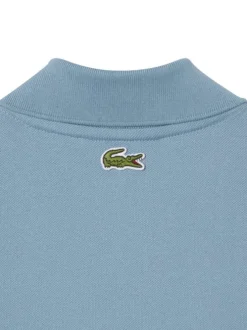 Polo en coton bleu en maille piquée avec une coupe droite et un col à revers