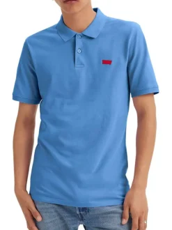 Polo en coton bleu en maille piquée avec une coupe slim et un col boutonné