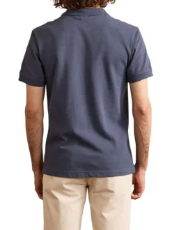 Polo en coton bleu gris uni avec une coupe droite et un col boutonné