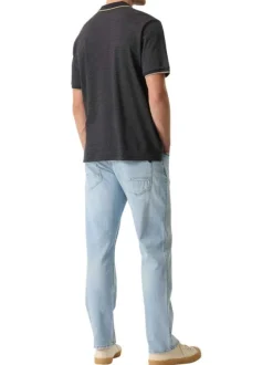 Polo en coton bleu marine uni avec une coupe droite et un col à revers