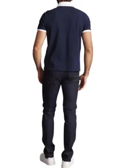 Polo en coton bleu marine uni à coupe slim fit avec des bandes de couleurs