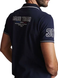Polo en coton bleu marine uni à coupe slim fit avec un col v à revers