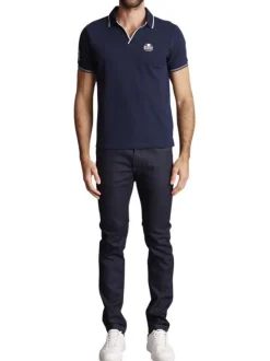 Polo en coton bleu marine uni à coupe slim fit avec un col v à revers