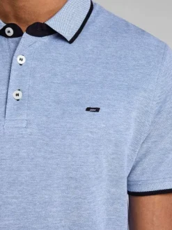 Polo en coton bleu Paulos avec une coupe droite et des boutons de fermeture à l'avant