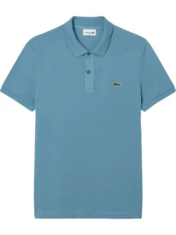 Polo en coton bleu uni avec une coupe droite et un col français