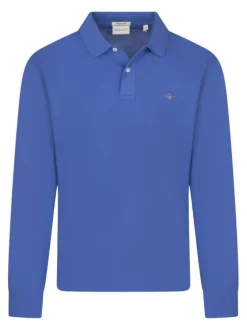 Polo en coton bleu uni à coupe ajustée avec col boutonné et des manches longues