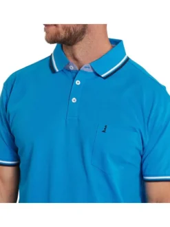 Polo en coton bleu uni à coupe droite un col boutonné et des manches courtes
