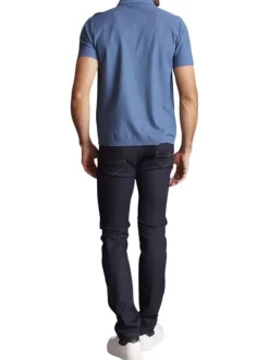 Polo en coton bleu uni à coupe regular fit avec des motifs piqués ton sur ton
