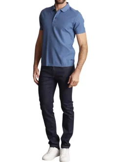 Polo en coton bleu uni à coupe regular fit avec des motifs piqués ton sur ton