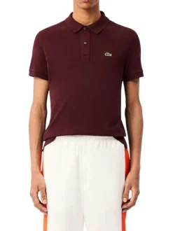 Polo en coton bordeaux uni avec une coupe cintrée et un col boutonné