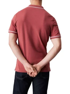 Polo en coton brique uni avec une coupe droite à col français