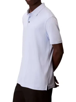 Polo en coton ciel à coupe droite pourvu d'un col à revers boutonné