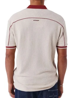 Polo en coton écru avec logo à coupe droite et à col boutonné