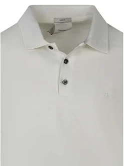 Polo en coton écru à coupe droite pourvu d'un col à revers boutonné