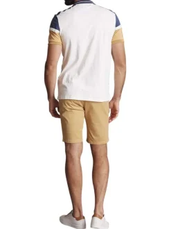 Polo en coton écru et bleu uni à coupe slim avec un col à revers zippé