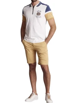 Polo en coton écru et bleu uni à coupe slim avec un col à revers zippé