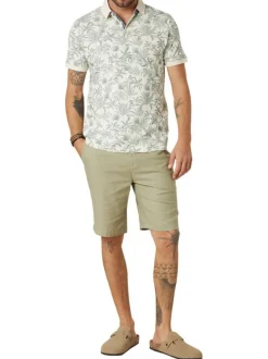 Polo en coton écru tropical pourvu d'une coupe droite et d'un col boutonné