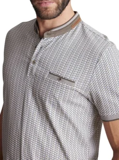 Polo en coton gris à imprimé monogrammes et avec un col boutonné et une poche
