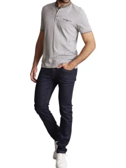 Polo en coton gris à imprimé monogrammes et avec un col boutonné et une poche