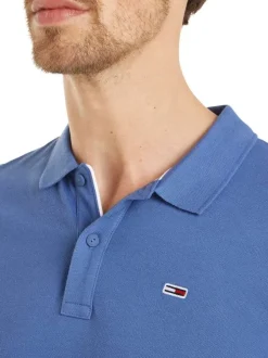 Polo en coton indigo uni avec un col boutonné et une coupe droite