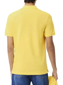 Polo en coton jaune à coupe droite pourvu d'un col à revers boutonné