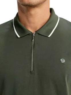 Polo en coton kaki uni pourvu de manches courtes et d'un col zippé