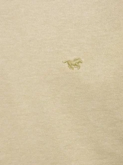 Polo en coton kaki uni pourvu d'un col boutonné et d'une coupe droite
