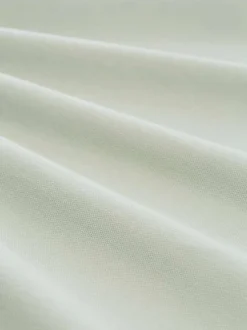 Polo en coton kaki uni pourvu d'une coupe droite et d'un col boutonné