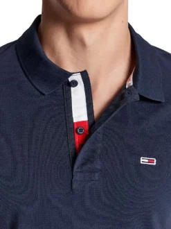 Polo en coton maille piquée marine avec une coupe droite et un col boutonné