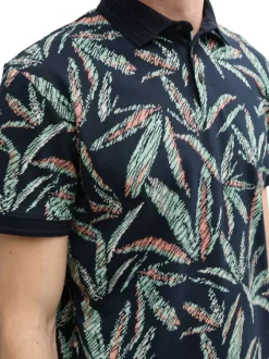 Polo en coton marine et vert à motif floral avec coupe droite et manches courtes