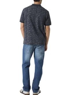 Polo en coton marine à imprimé floral avec une coupe droite et un col à revers
