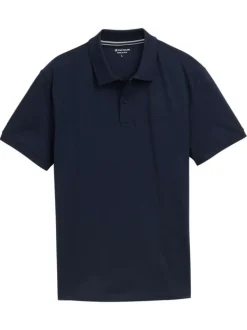 Polo en coton marine uni avec une coupe droite et un col boutonné