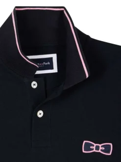 Polo en coton marine uni avec une coupe droite et un col à revers boutonné