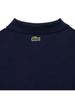 Polo en coton marine uni à coupe droite et col fermé par boutons ton sur ton