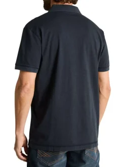 Polo en coton marine uni pourvu d'un col boutonnée et de manches courtes