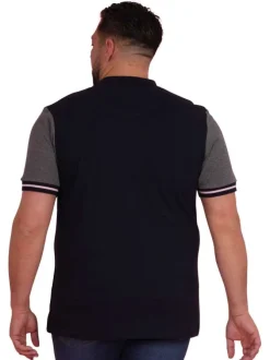 Polo en coton marine uni pourvu d'un col boutonné et d'une coupe droite