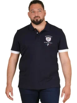 Polo en coton marine uni pourvu d'un écusson brodé et d'une coupe droite