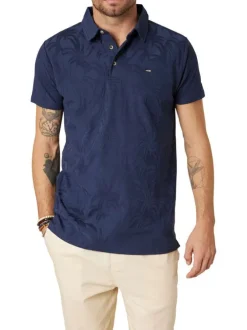 Polo en coton marine uni pourvu d'une coupe droite et d'un col boutonné