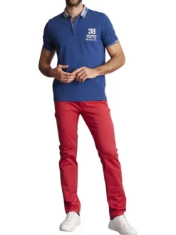 Polo en coton mélangé bleu uni à coupe droite imprimé à la poitrine gauche