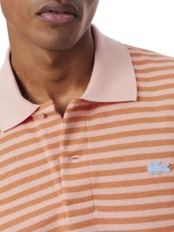 Polo en coton mélangé orange à rayures pourvu d'un col boutonné