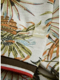 Polo en coton à motifs de feuillage col boutonné et à manches courtes