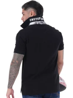 Polo en coton noir uni avec une coupe droite et logo iconique
