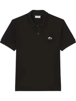 Polo en coton noir uni avec une coupe droite et un col boutonné