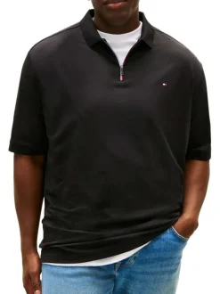 Polo en coton noir uni avec une coupe droite et un col à revers zippé