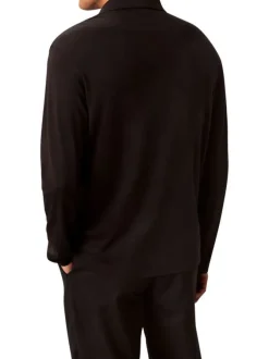 Polo en coton noir uni coupe ajustée et un col à revers boutonné