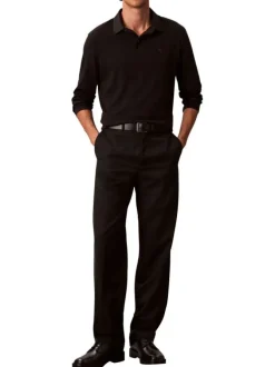 Polo en coton noir uni coupe ajustée et un col à revers boutonné