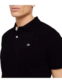 Polo en coton noir uni coupe droite avec un col boutonné et en maille piquée